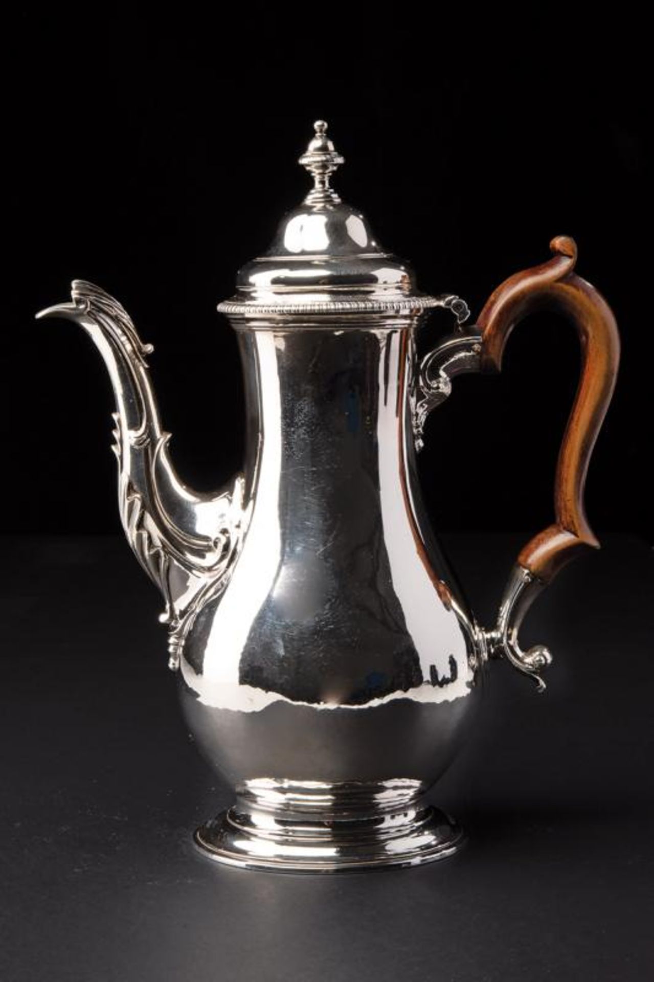 A sterling silver coffee pot