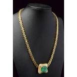 Diamond and emerald center 18 kt gold necklace