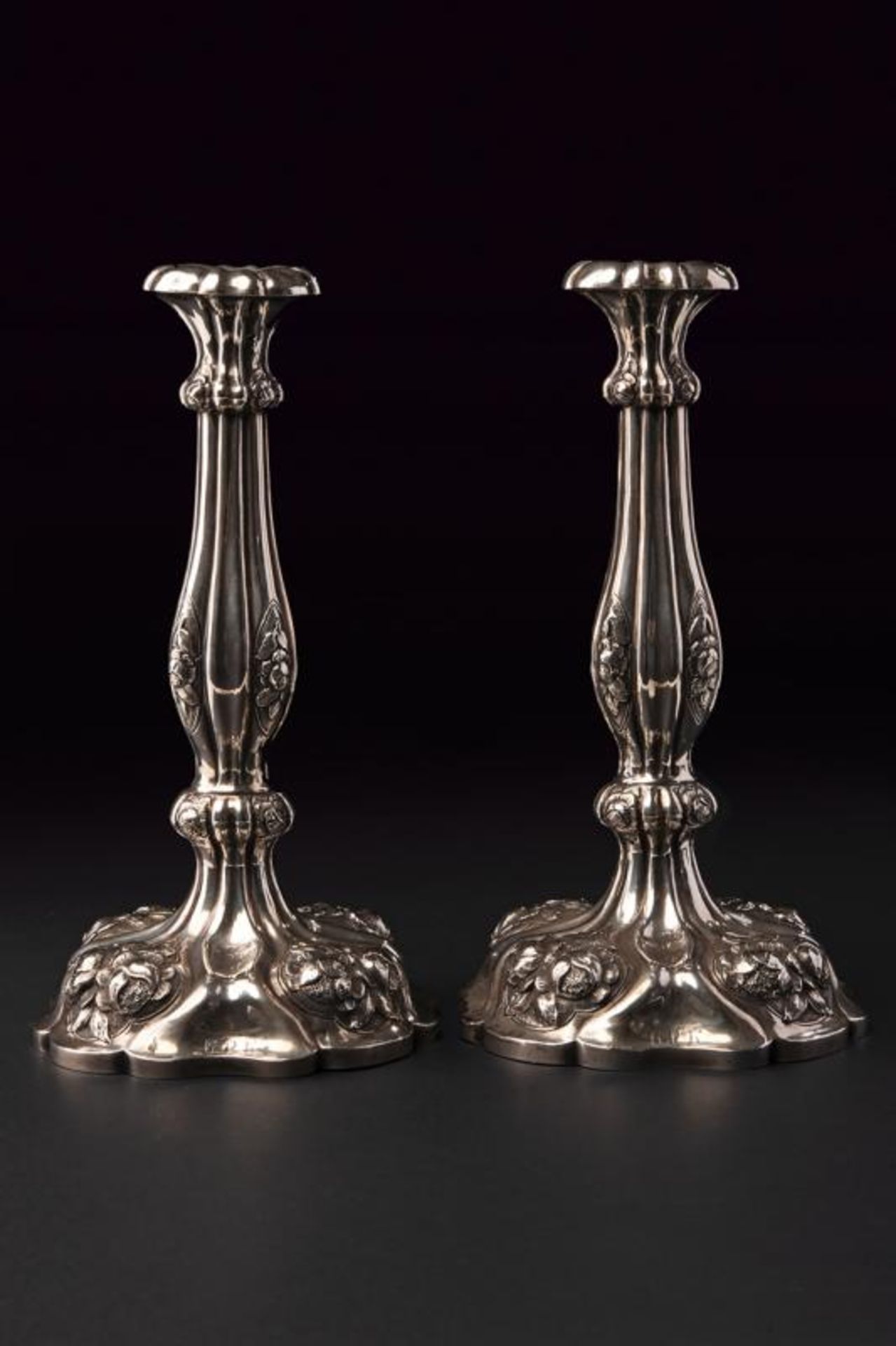 A silver pair of candlesticks