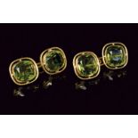 18 kt gold cufflinks set with green rhinestones