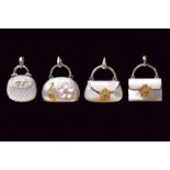 Lot of four handbag shaped gold and MOP charm pendants