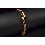 Rose gold chain link bracelet with ebony elements