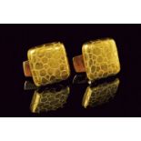 A pair of 18 kt gold cufflinks