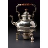 A sterling silver tea kettle