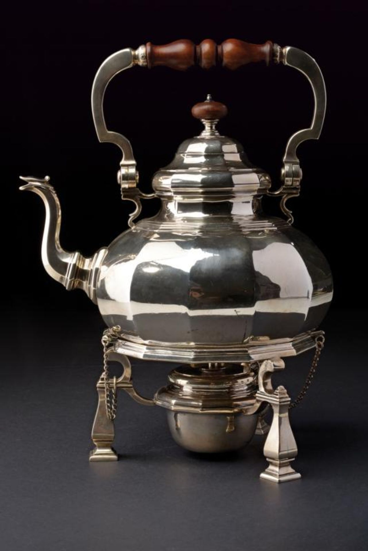 A sterling silver tea kettle