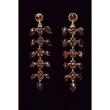 Gold and garnets pendant earrings