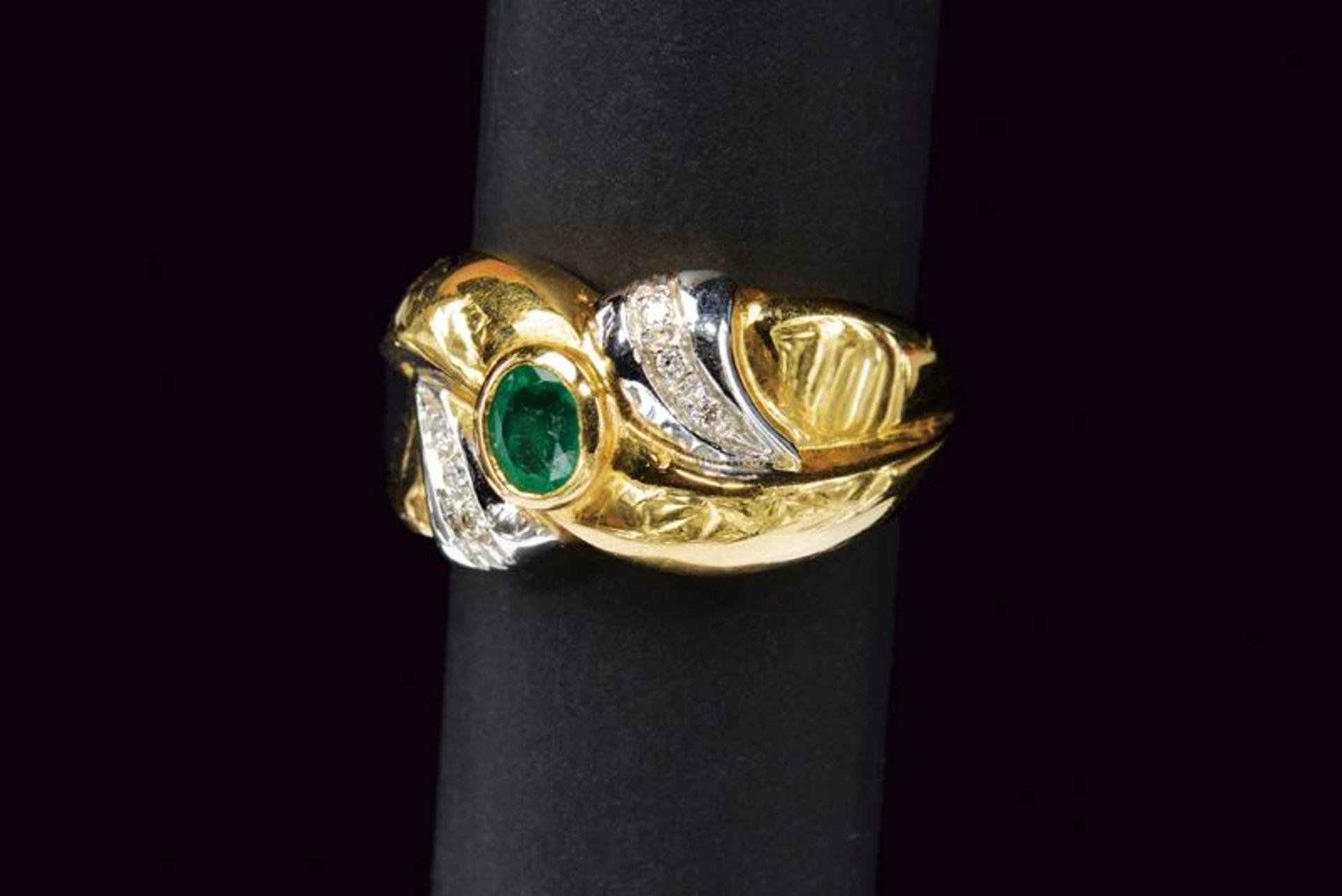 Diamond and emerald gold band ring