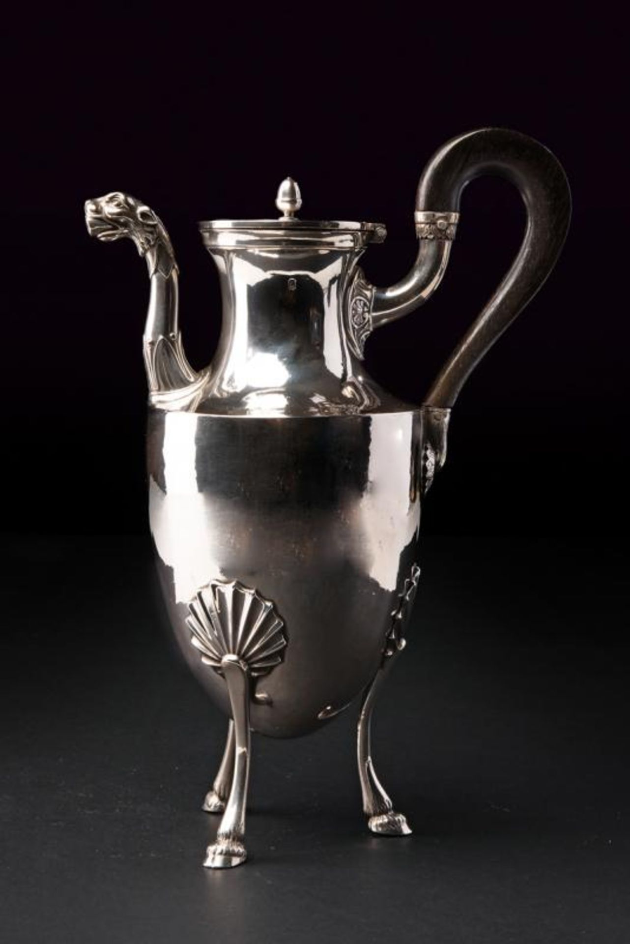 A silver coffee pot