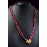 Rubies, gold and diamond necklace