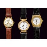 A collection of three ladies' wristwatches