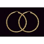 UNOAERRE Large gold twist hoop earrings