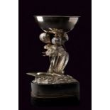 A silver figural motorboat trophy cup
