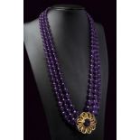 Three-strand necklace in amethyst and gold