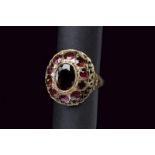 Gold ring set with garnets