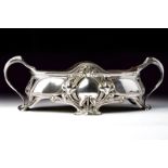 A silver jardiniere centerpiece