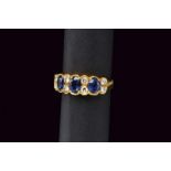Diamond and sapphire gold band ring