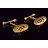 A pair of 18 kt gold cufflinks