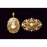 Lot of two gold gem set brooches