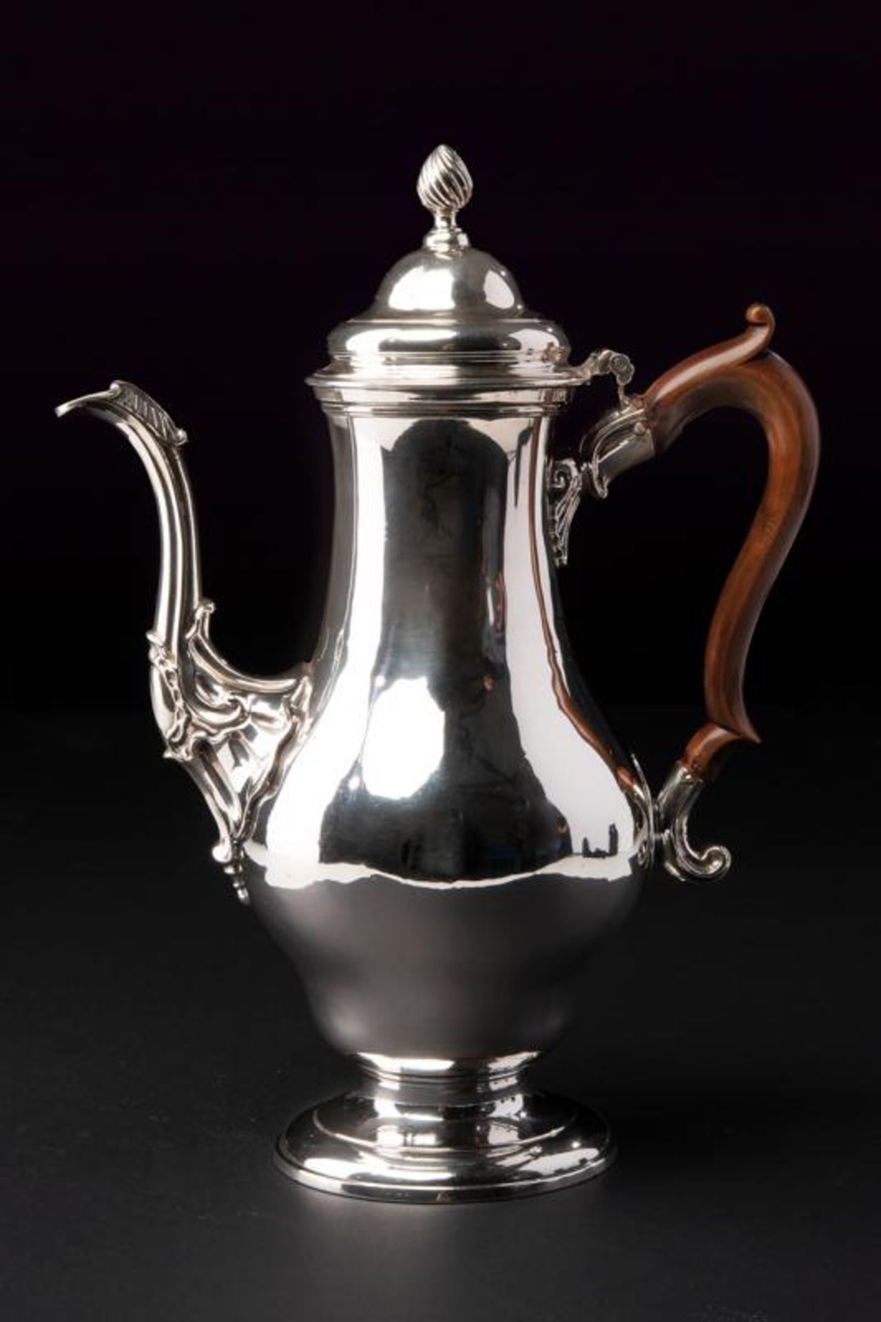 A sterling silver coffee pot