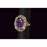 Antique amethyst and diamond oval white gold ring