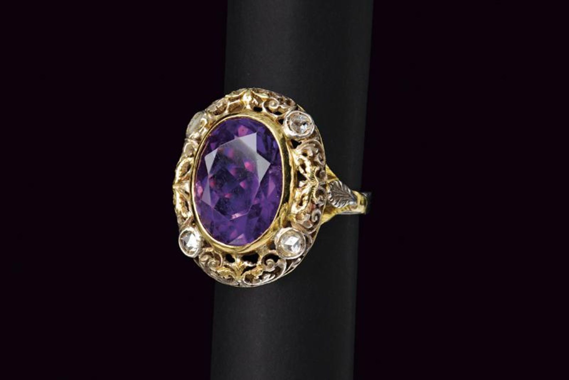 Antique amethyst and diamond oval white gold ring