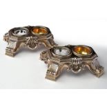 A silver pair of double salt cellars