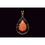 14 kt gold coral pendant