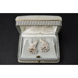 Pair of platinum diamonds stud cornucopia earrings