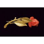 Gold carved coral rose bud pin brooch
