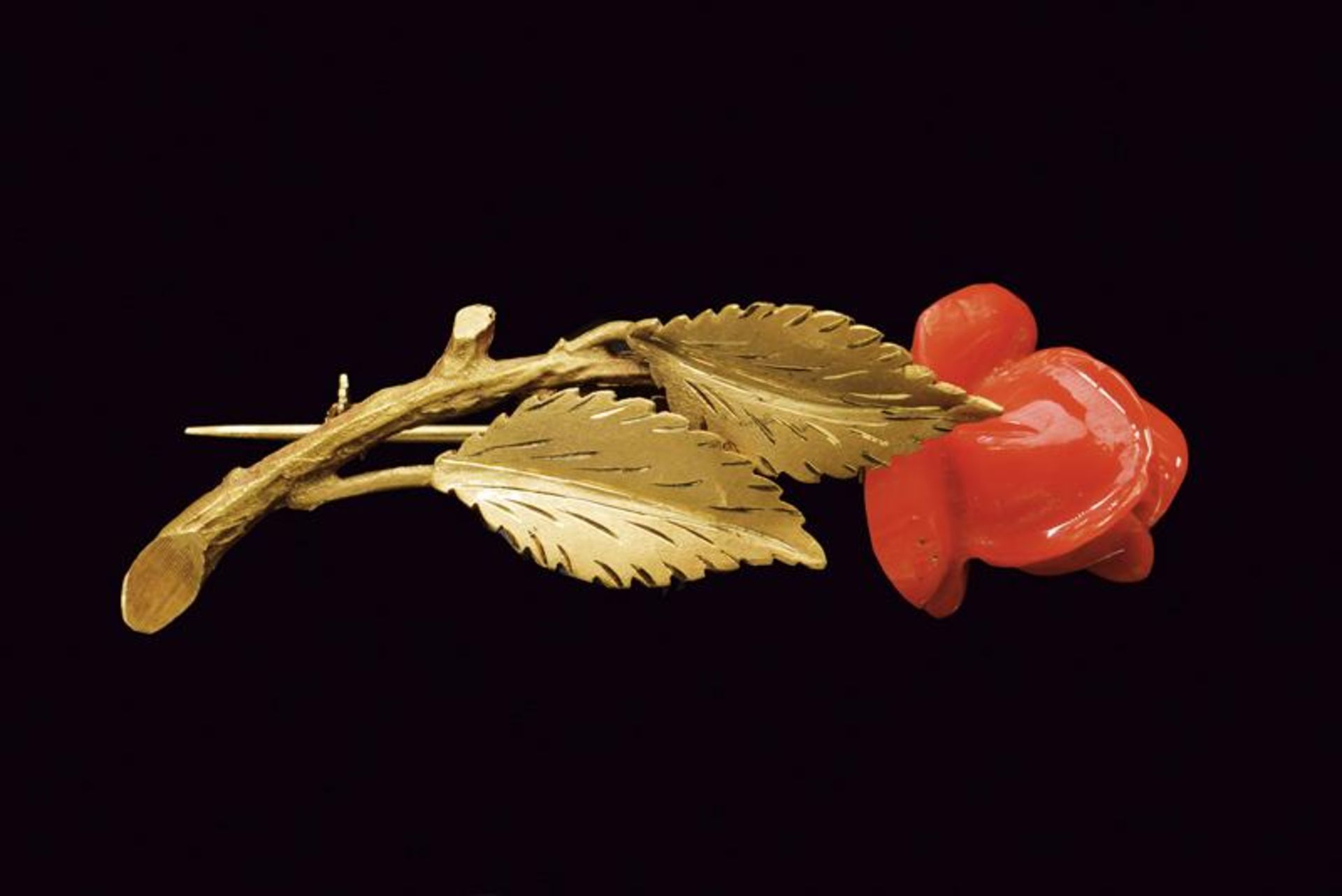 Gold carved coral rose bud pin brooch