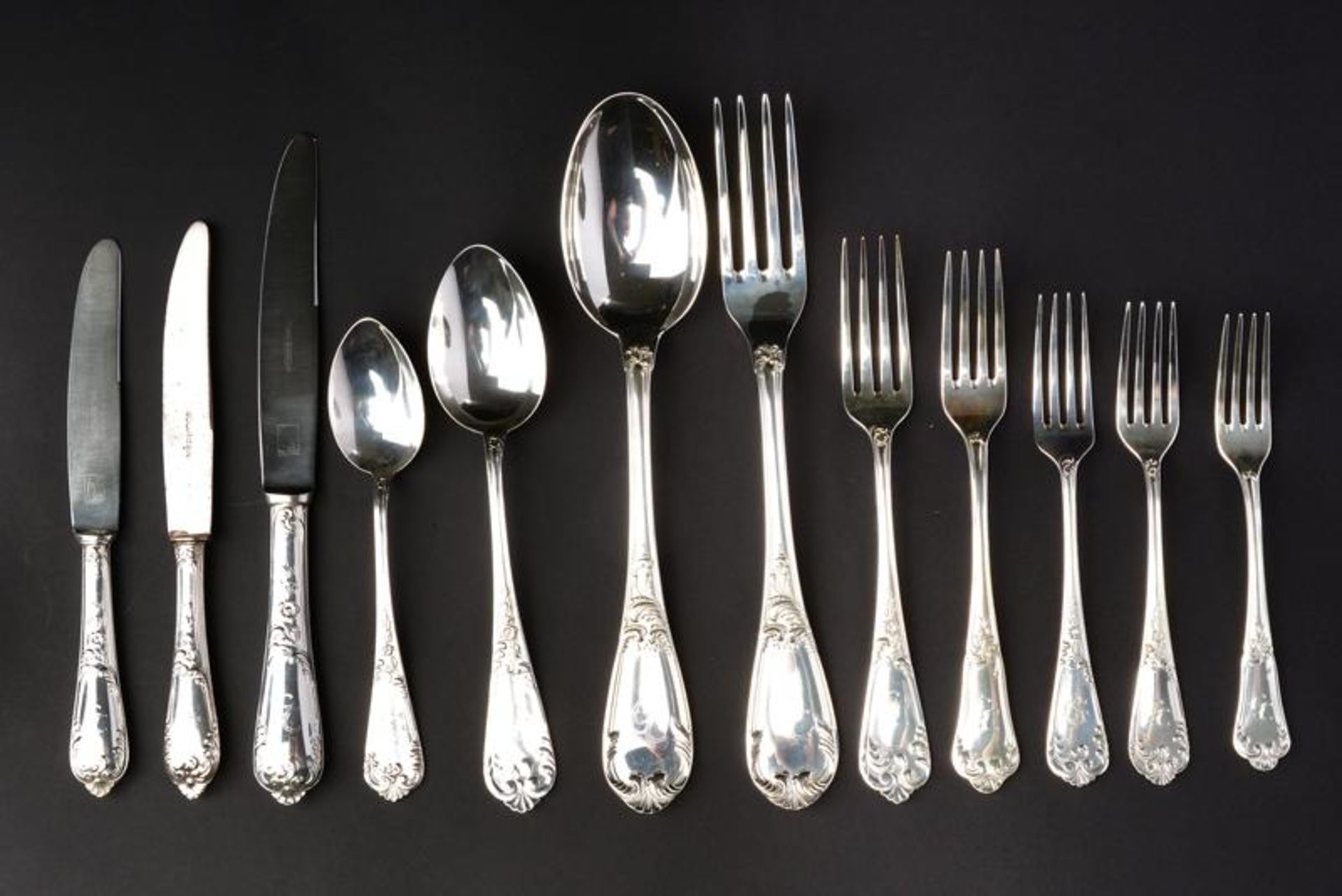 A silver flatware service