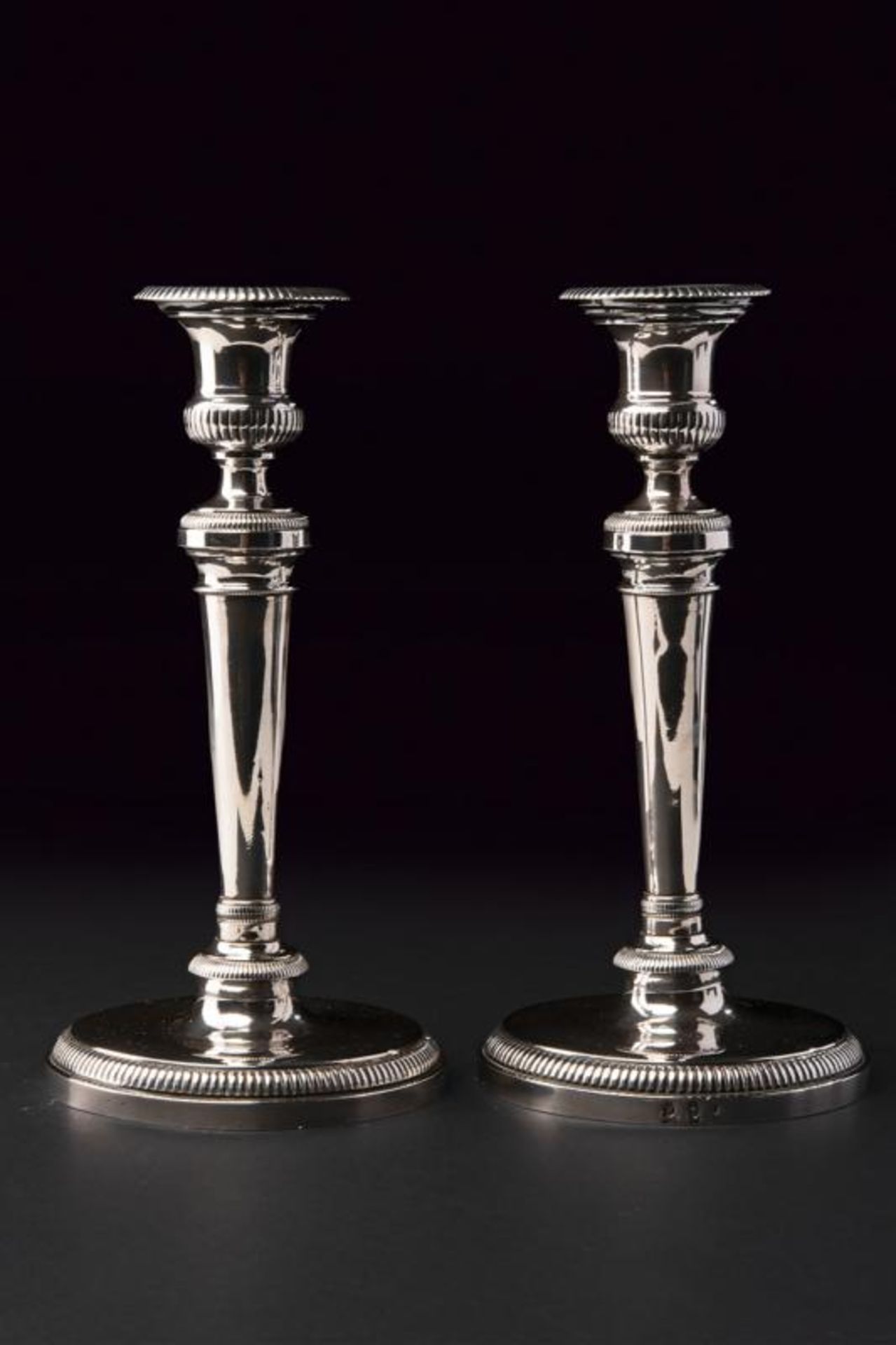 A silver pair of candlestiks