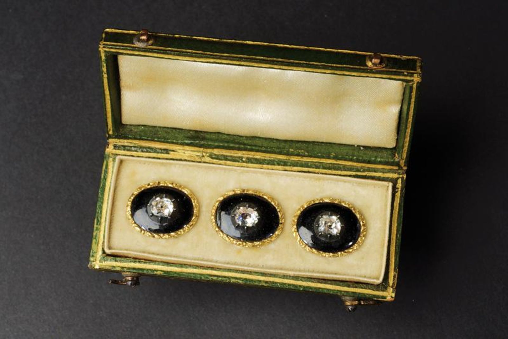 Set of three gold, enamel and diamond buttons