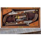 A pair of cased percussion pistols by Campbell