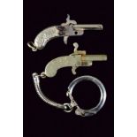 A lot of two miniature pin fire pistols