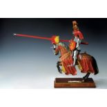 A beautiful sculpture of an equestrian jousting knight