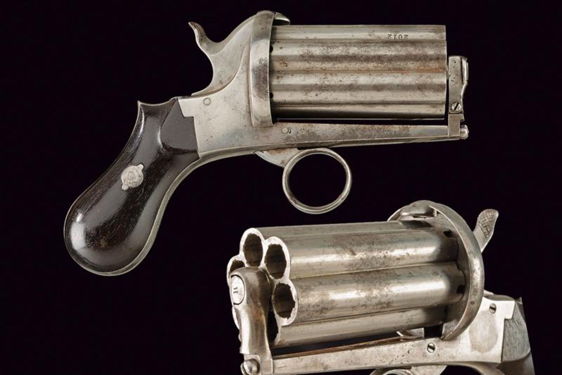A pin fire pepperbox revolver