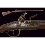 A flintlock gun signed Lamothe a Caen