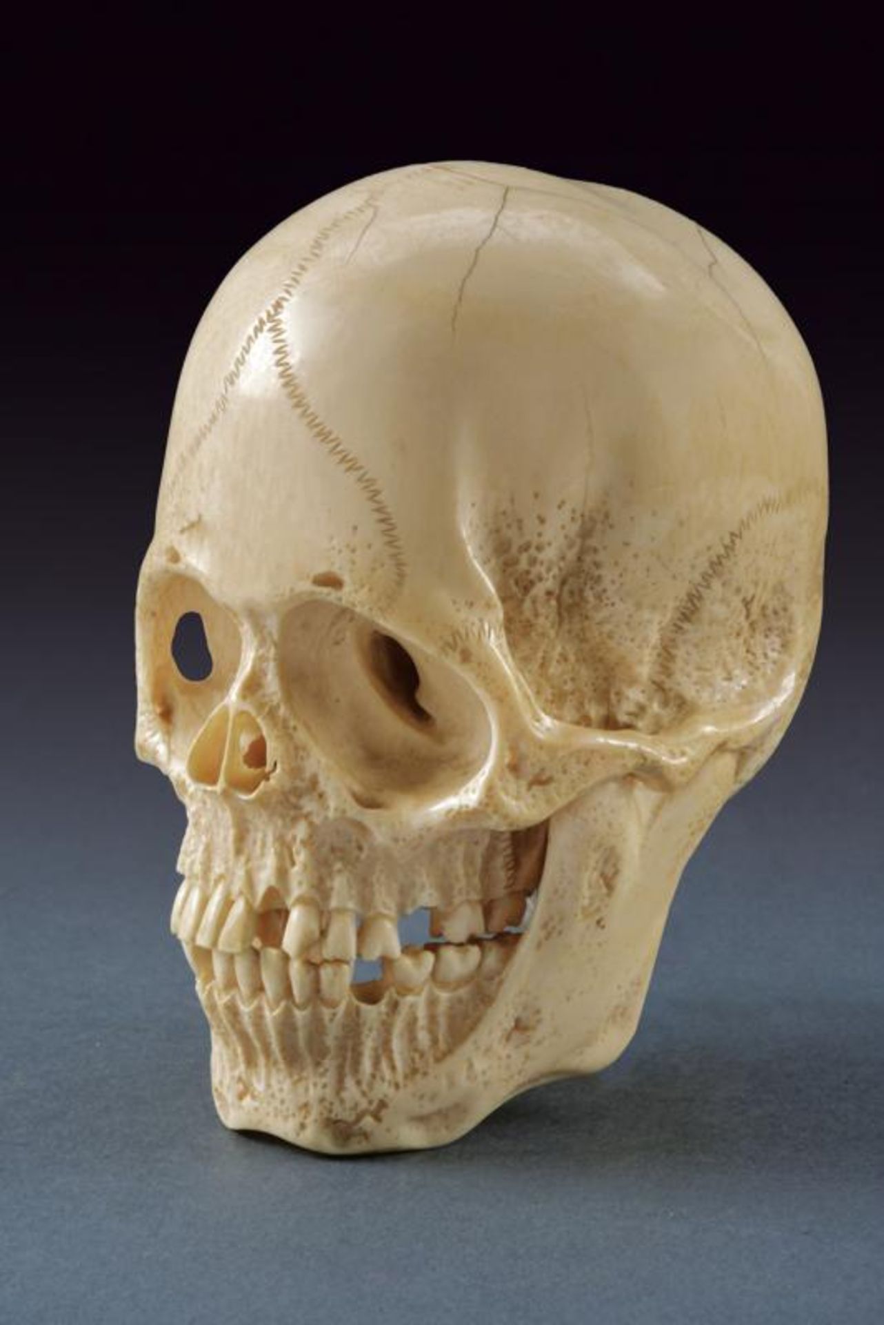 A magnificent skull-shaped okimono