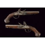 A pair of double-barreled flintlock pistols by Lamotte Laine