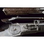 A beautiful wheel-lock rifle by the 'Master of the animal head scrolls'