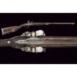 A double-barreled flintlock shotgun