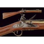 A flintlock blunderbuss gun with spring bayonet by Wheeler