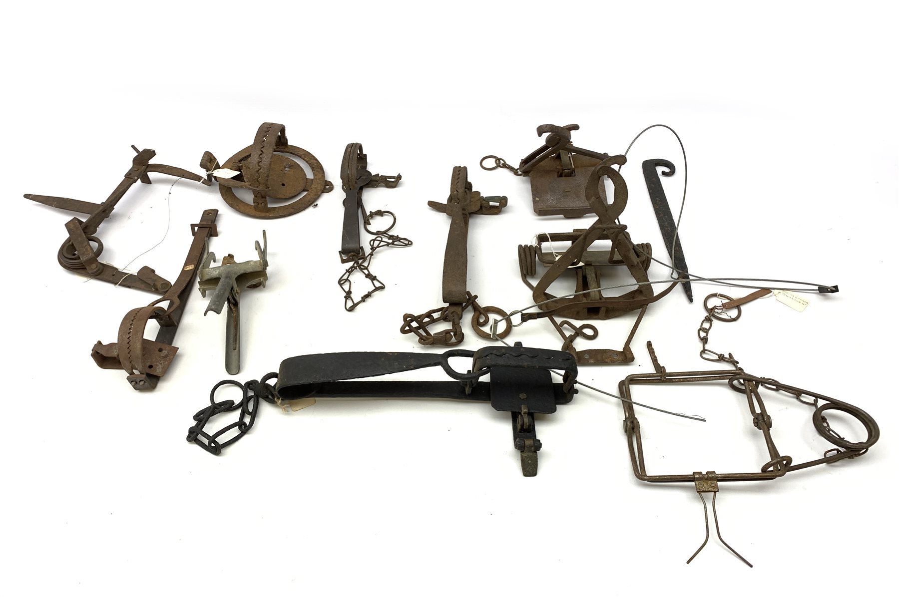Ten animal traps and snares including Imbra, 'The Juby Trap', H. Lane gin trap, Pole Trap, mole trap