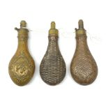 Three Victorian G. & J.W. Hawksley Sheffield brass and copper powder flasks, one embossed with horse