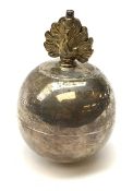 Asprey & Co. Ltd silver mess cigar lighter in the form of a globular grenade with gilded flambe fini