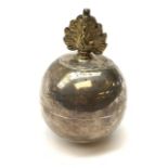 Asprey & Co. Ltd silver mess cigar lighter in the form of a globular grenade with gilded flambe fini