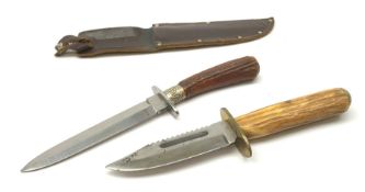Bowie knife, the 12cm steel single edged saw-back blade marked to the ricasso George Wostenholm Shef