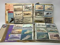 Two albums containing over one thousand postcards of aircraft, aviation and naval interest including