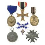 Six WW2 German medals/decorations comprising Red Cross Social Welfare Medal, bronze RAD Long Service
